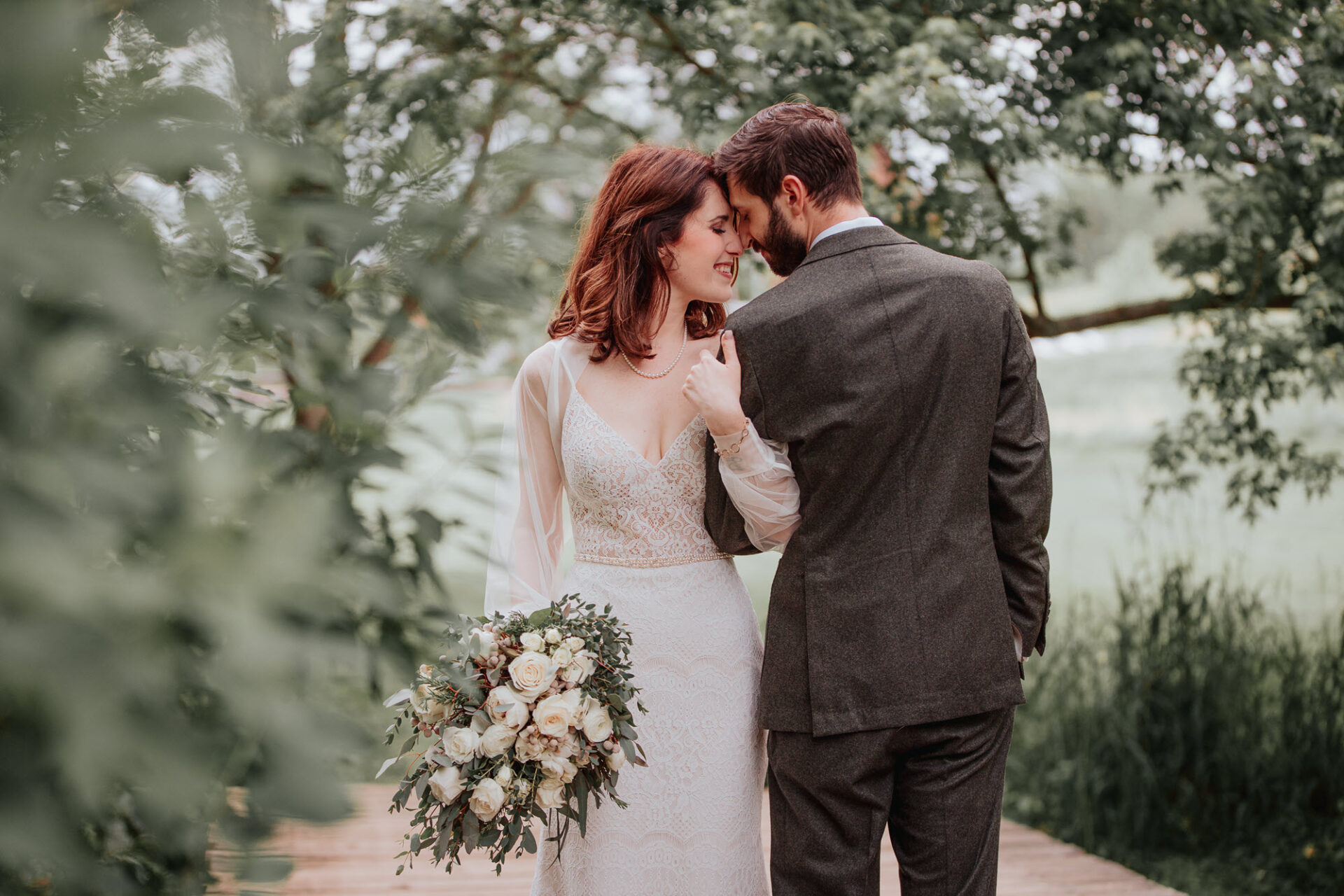 Happy Couple with Bouquet - Celebrating Love at a Simple Wedding